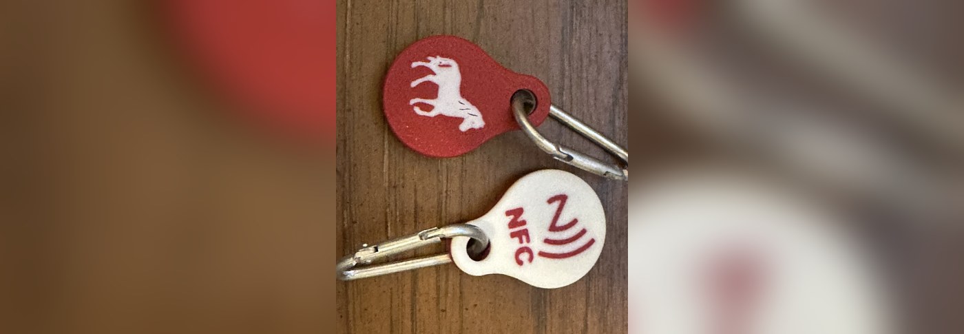Smart Tags with horse silhouette, both sides shown, ready to attach to a halter or feed bucket