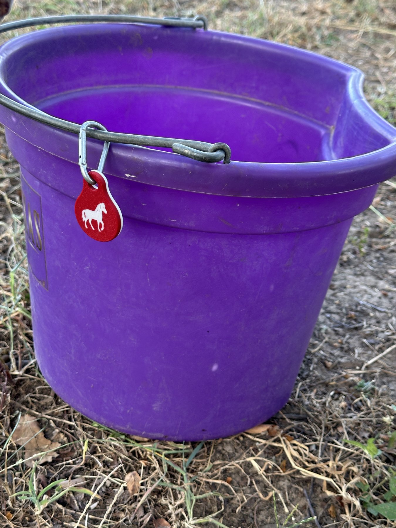 Smart Tag clipped to a horse feed bucket